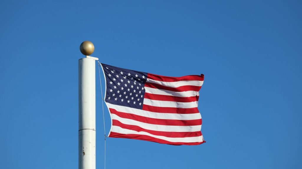 American flag waving — free VA benefits help in San Antonio for veterans